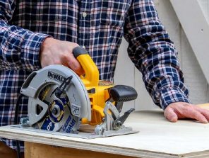 close up picture of working with cordless power saw