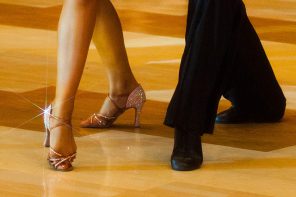 picture of girl and boy legs on the dancefloor with outfit and perfect dancing shoes