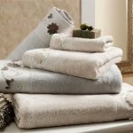 white bath towels with some details