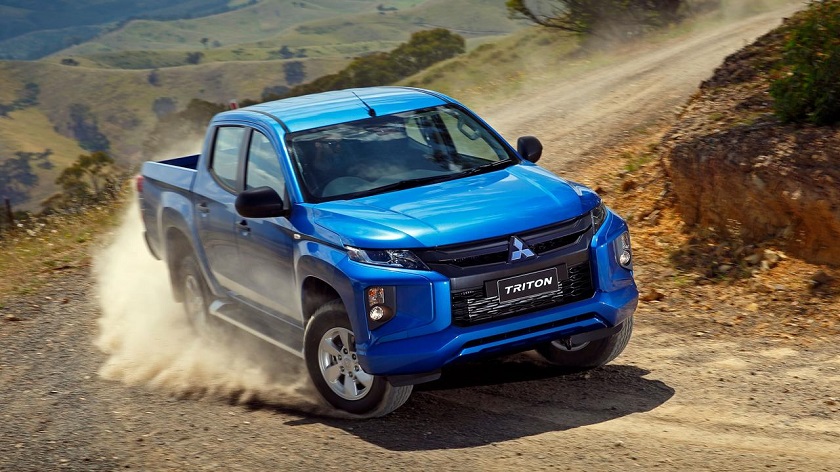 Blue Mitsubishi Triton off road