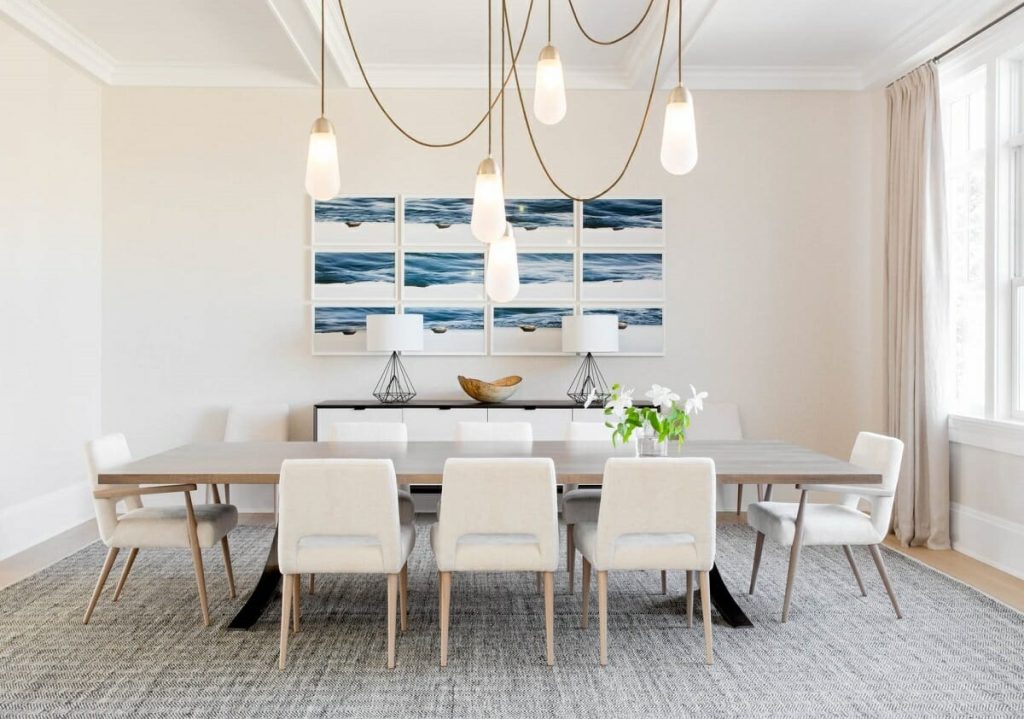 dining room in coastal style, with a decorative lamp above