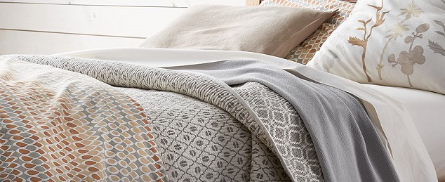 close up of a bed quilt