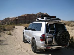 Mitsubishi Pajero with aftermarket exhaust off road