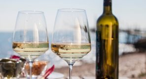 bottle and glasses of white wine