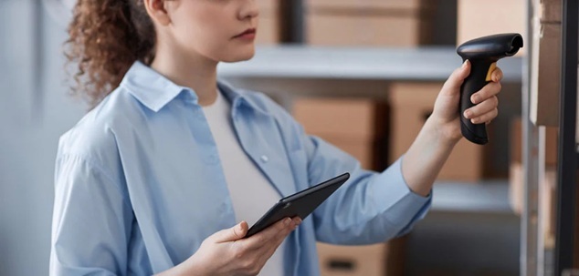 woman using bluetooth barcode scanner