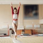 little girl in gymnastic clothes