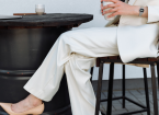 woman wearing white elegant pants